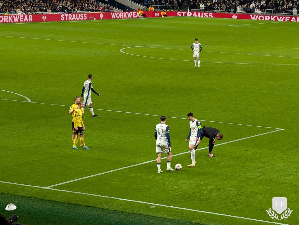 Preparing to take a free kick